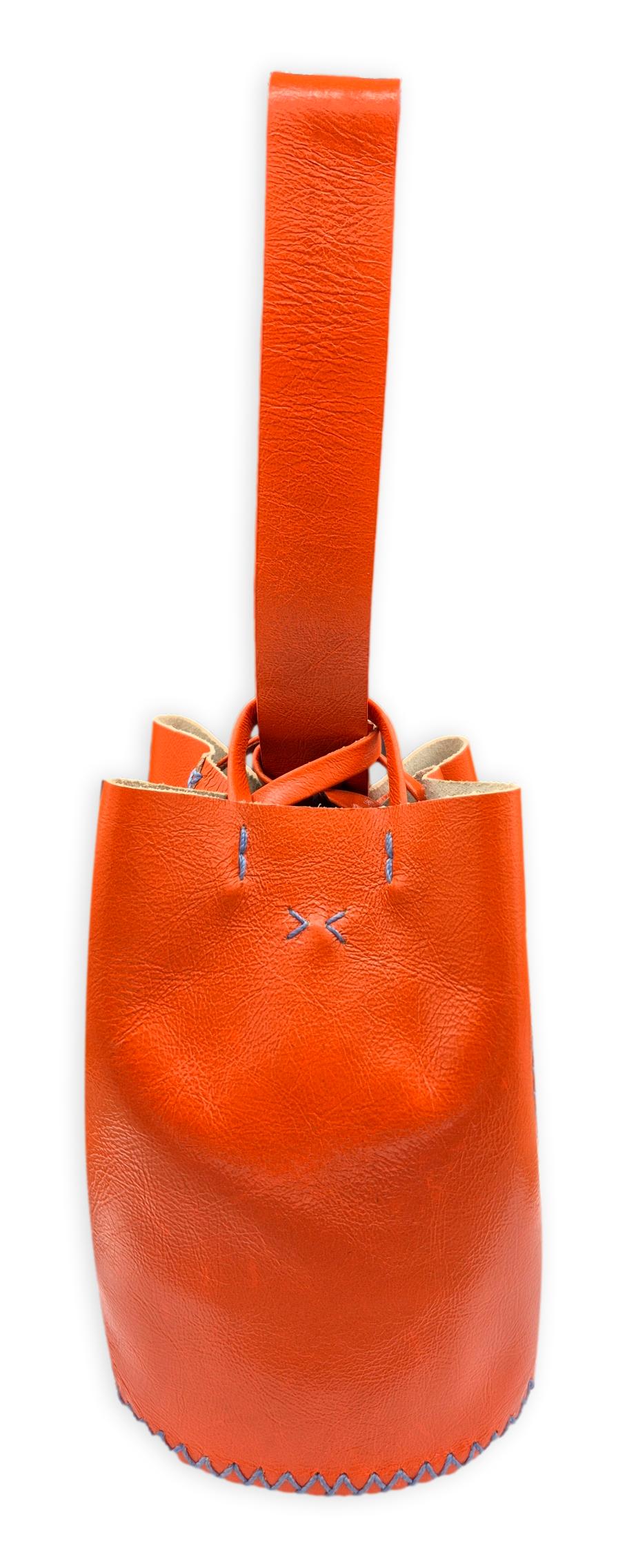 navigli bag | dark orange upcycled leather with blue stitches