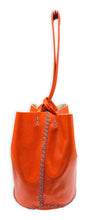 navigli bag | dark orange upcycled leather with blue stitches