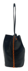 navigli bag | black floater upcycled leather with orange stitches