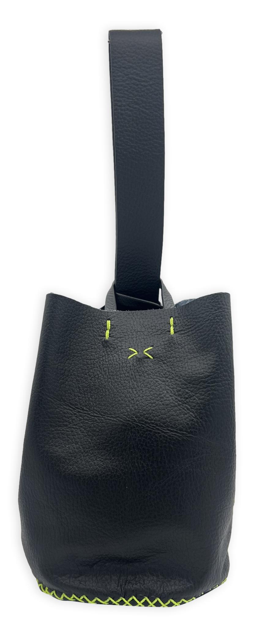 navigli bag | black upcycled floater leather with neon stitches
