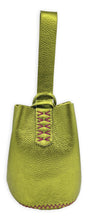 navigli bag | metallic green upcycled leather with pink stitches
